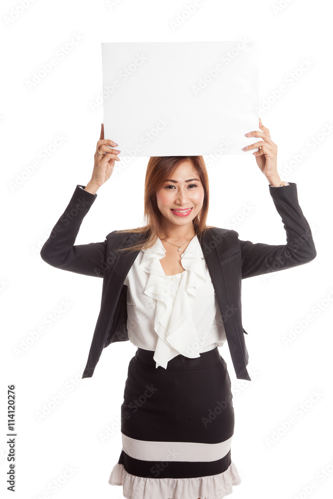 Young Asian business woman with white blank sign Young Asian business woman with white blank sign