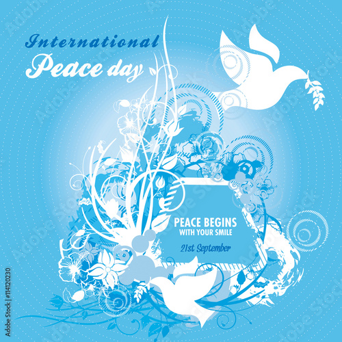 Two doves carrying an olive branch with elaborate floral designs for International Peace Day