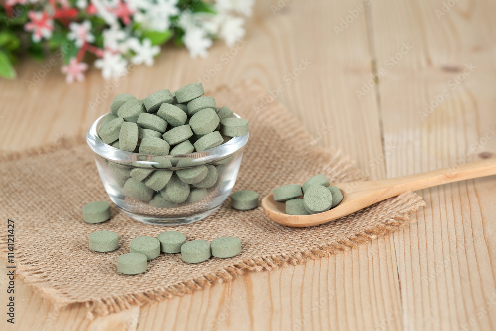Herbal pill on bowl. herb for healthy living. Herbal pill on bowl. herb for healthy living.