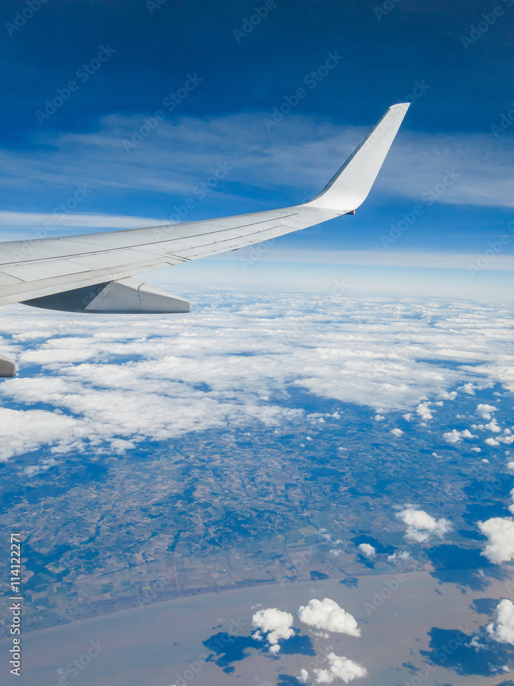 Wing of an airplane in flight Wing of an airplane in flight