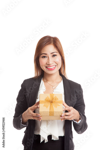 Young Asian business woman with a golden gift box