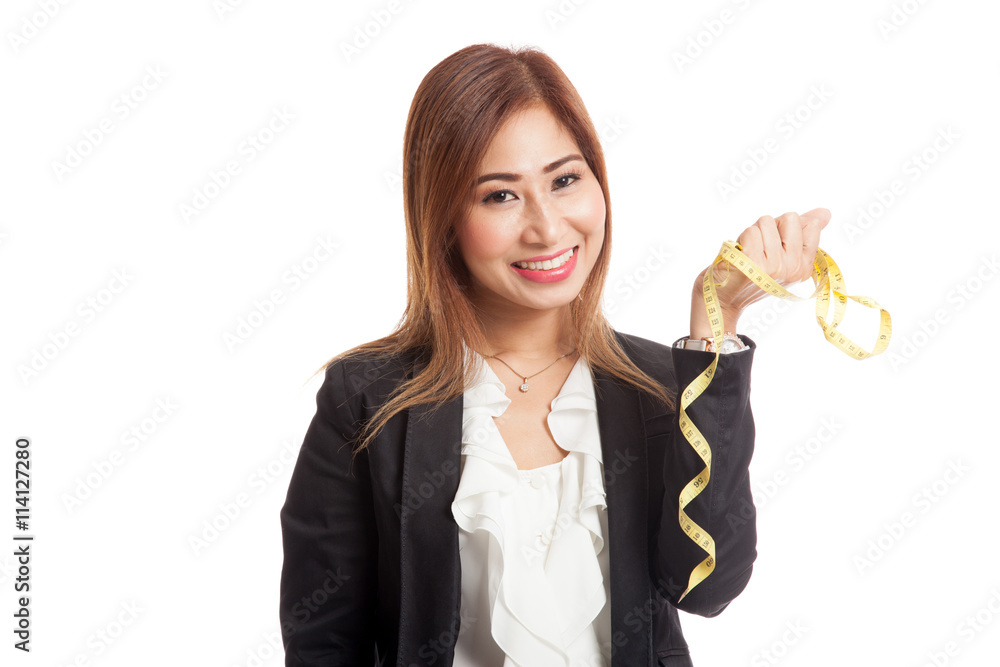 Young Asian business woman with measuring tape Young Asian business woman with measuring tape