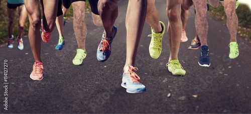 Composite image of close up of sportsman legs running 