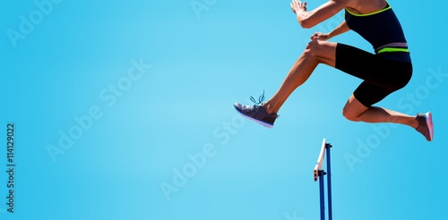 cropped image of woman practicing show jumping photo