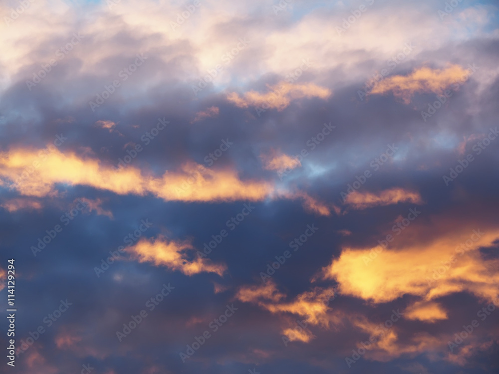 sunset sky with clouds above the forest