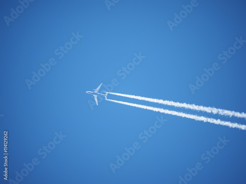 plane in the sky © enskanto