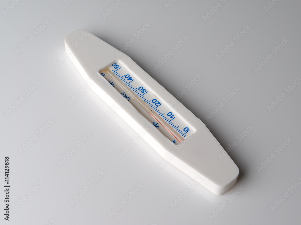 thermometer on a gray background thermometer on a gray background