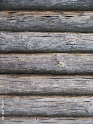 Old log cabin wood wall. background