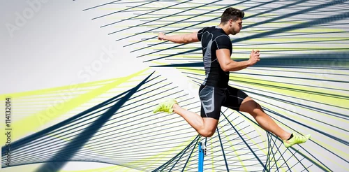 Fototapeta Złożony wizerunek sportowego mężczyzna przedstawienia ćwiczy doskakiwanie