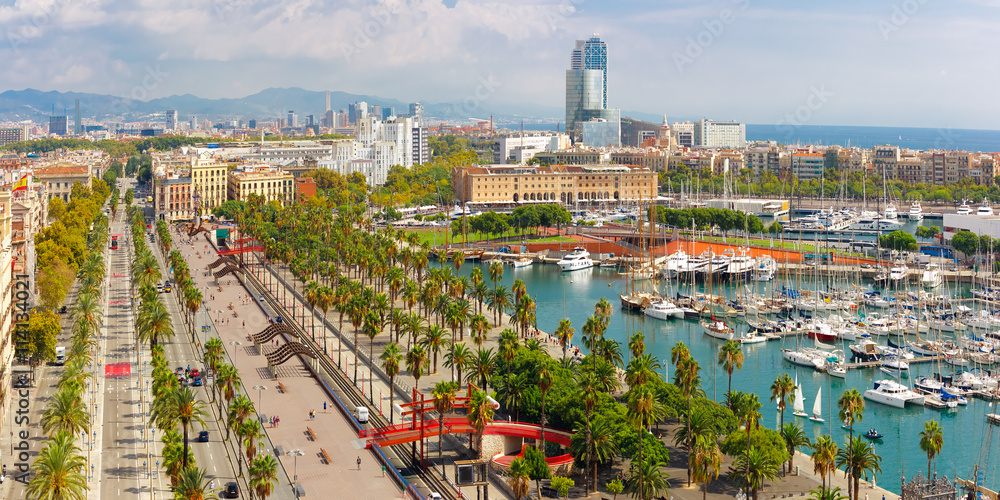 Aerial panoramic view over Passeig de Colom or Columbus avenue, La Barceloneta and Port Vell marina from Christopher Columbus monument in Barcelona, Catalonia, Spain - obrazy, fototapety, plakaty 