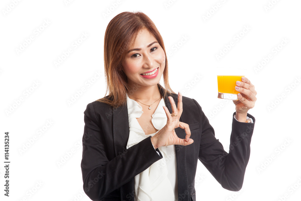 Young Asian woman show OK drink orange juice Young Asian woman show OK drink orange juice