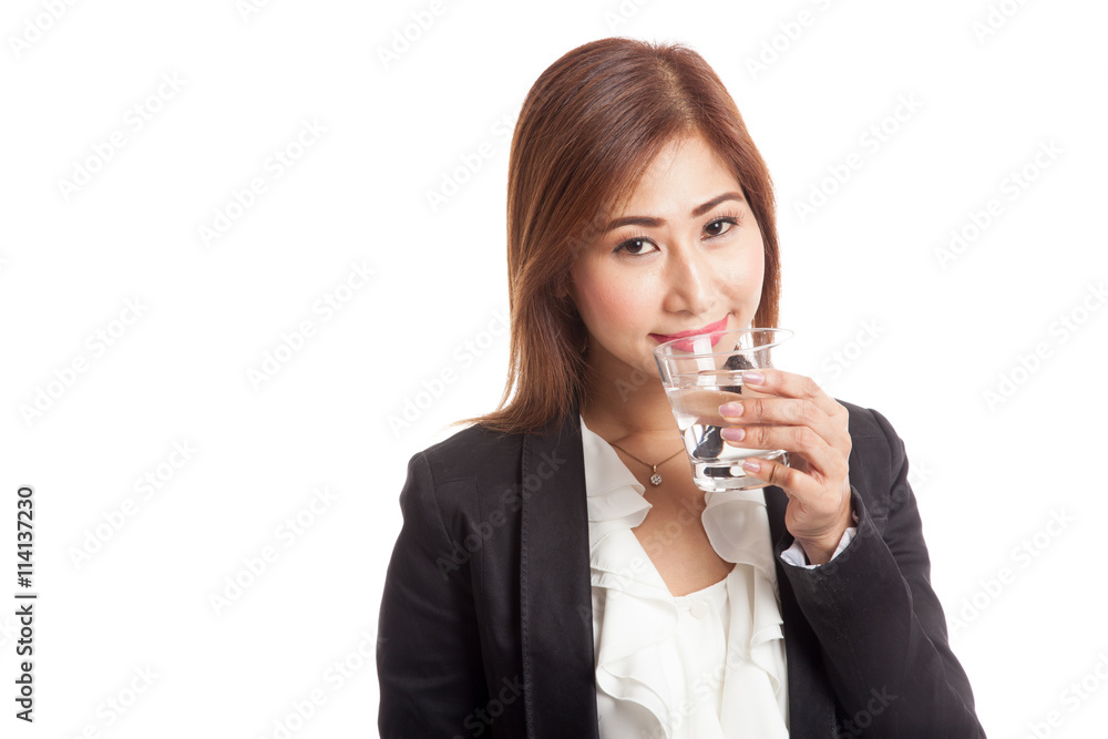 Young Asian woman with a glass of drinking water Young Asian woman with a glass of drinking water