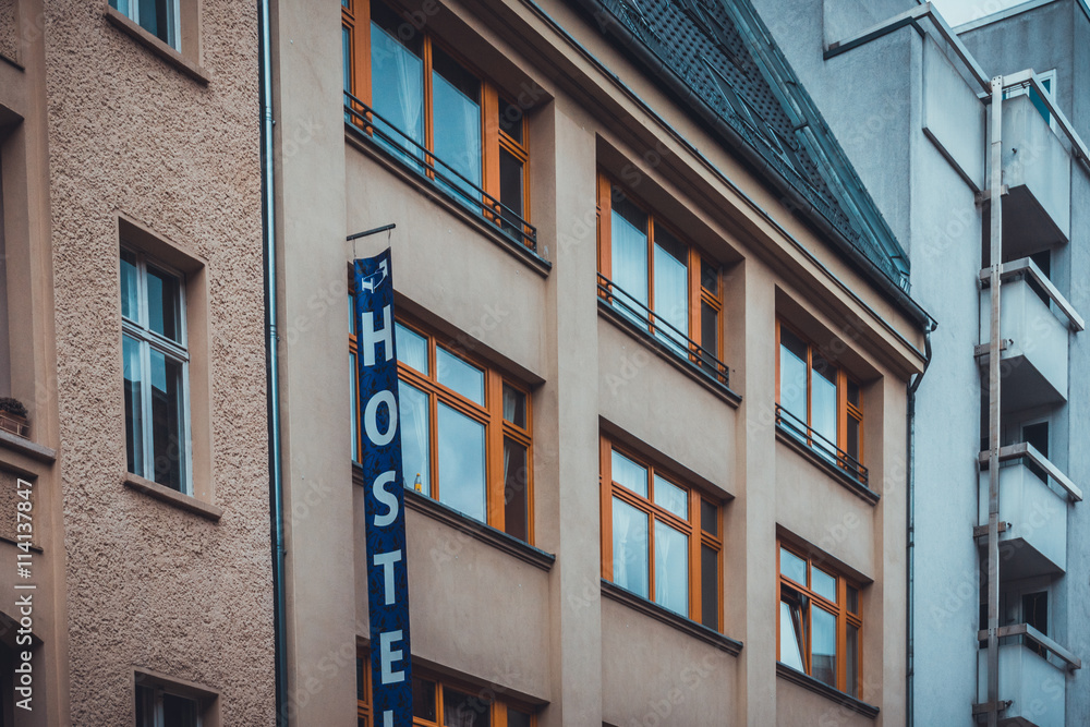 Low Rise Urban Hostel Residence with Vertical Sign Low Rise Urban Hostel Residence with Vertical Sign