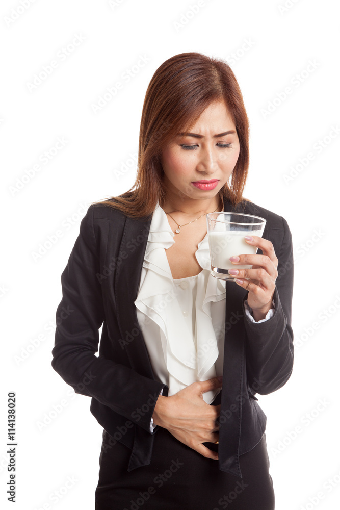 Asian woman drinking a glass of milk got stomachache Asian woman drinking a glass of milk got stomachache