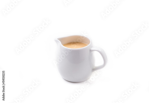 Fotografi White Jar of Sweetened condensed milk isolated on white backgrou