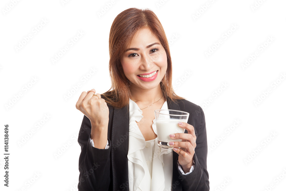 Healthy Asian woman drinking a glass of milk Healthy Asian woman drinking a glass of milk