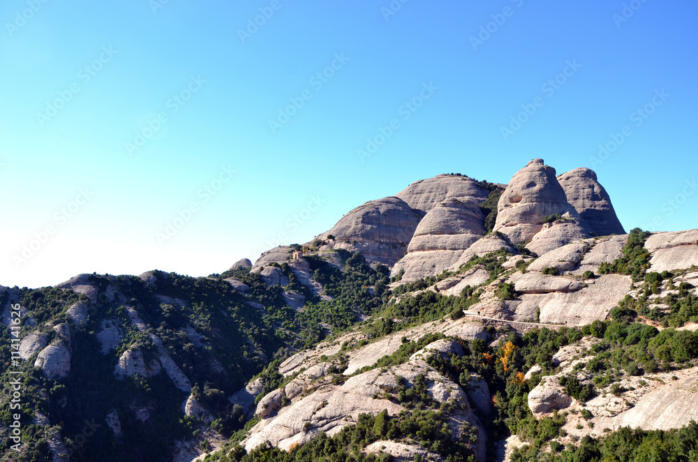 Small stone chapel on the mountainside of the mountains of Montserrat, Catalonia, Spain