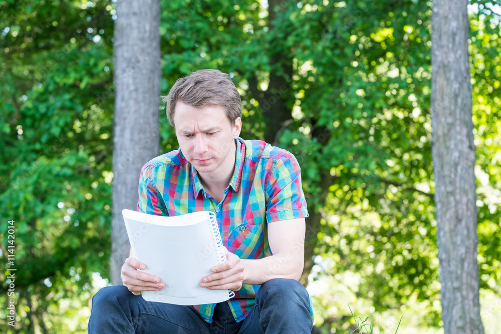 Young man reading Young man reading