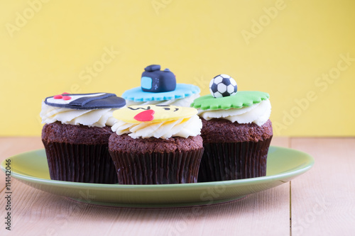 Delicious cupcakes on table