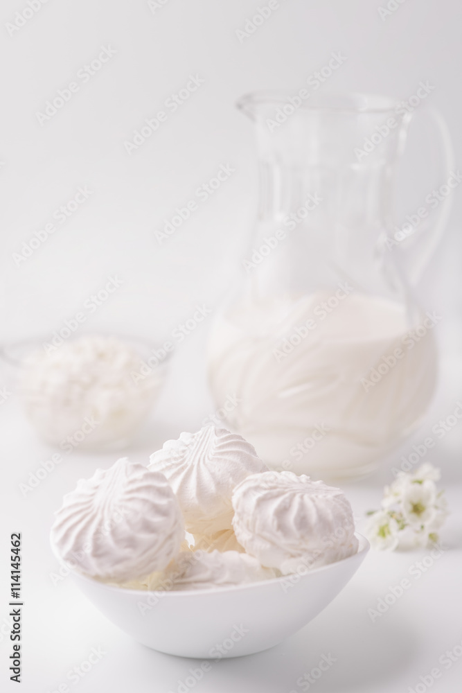 marshmallows and milk products, on a white background marshmallows and milk products, on a white background