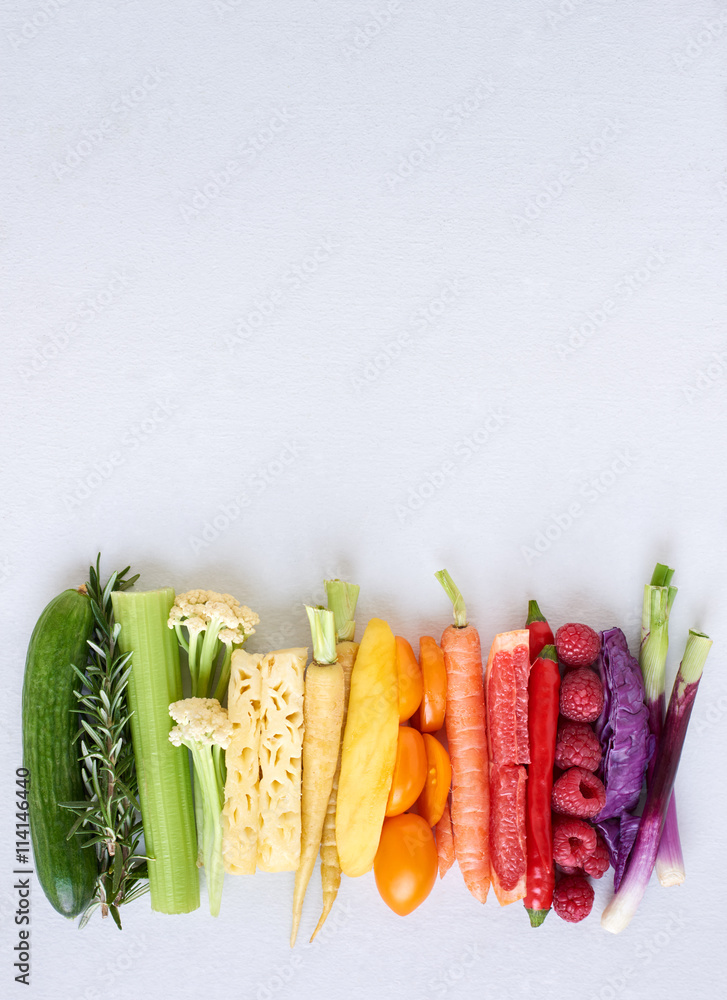 Foto Rainbow fruit and vegetable collection on white background