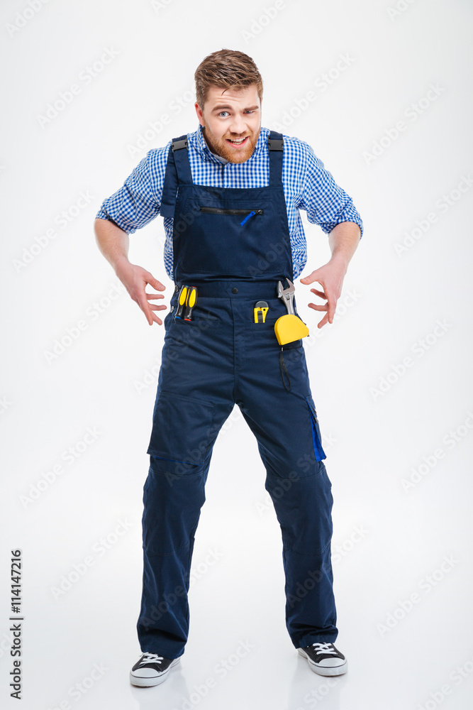 Full length portrait of a funny male builder Full length portrait of a funny male builder