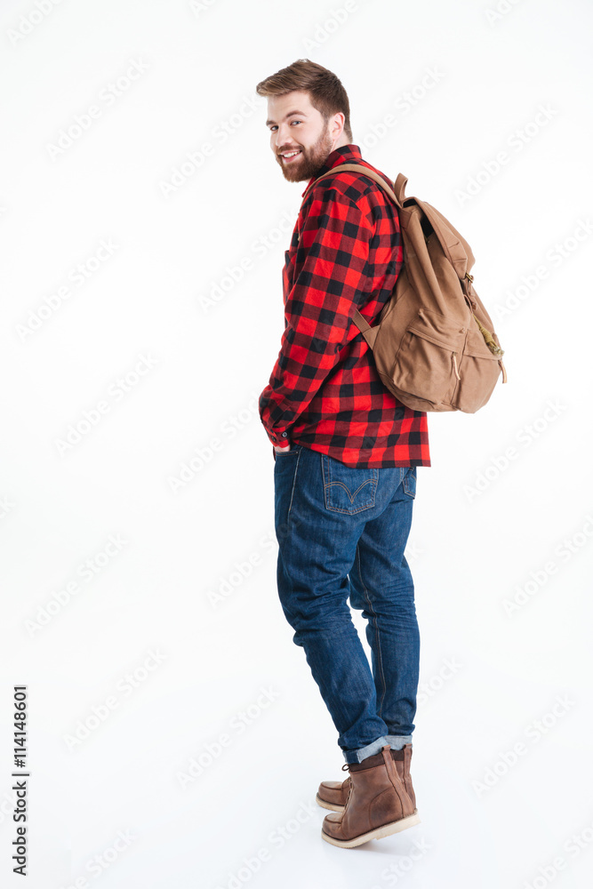Casual man looking back at camera Casual man looking back at camera
