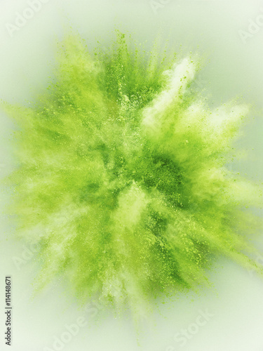 Abstract green powder explosion
