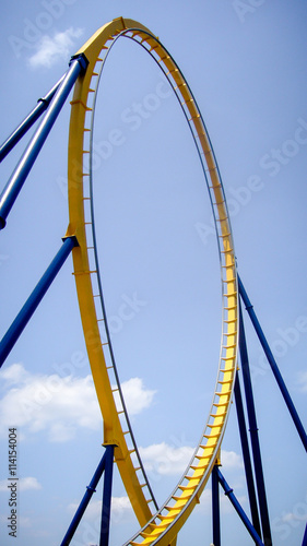 roller coaster yellow rail, blue sky