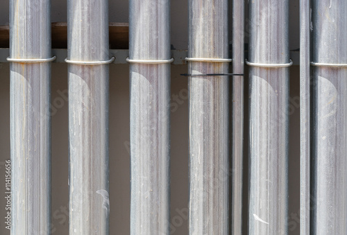 Metal pipe on in cement wall  