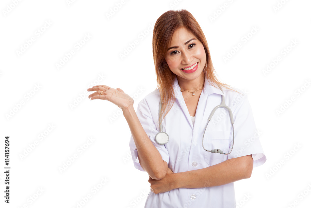 Asian young female doctor show something on her hand Asian young female doctor show something on her hand