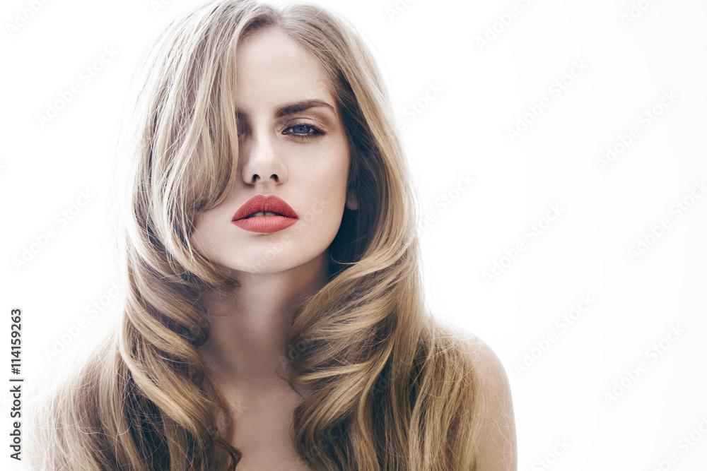 girl with red lips and healthy hair on the white background