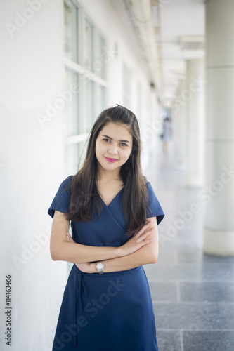 A portrait of an Asian university student on campus Free Download A portrait of an Asian university student on campus - GFXLoad