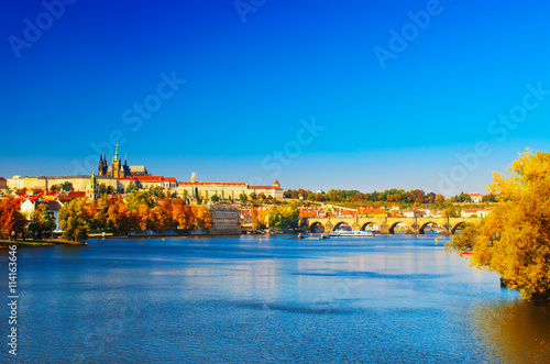 Prague Castle and Old City day view with blue sky, travel vivid autumn european background