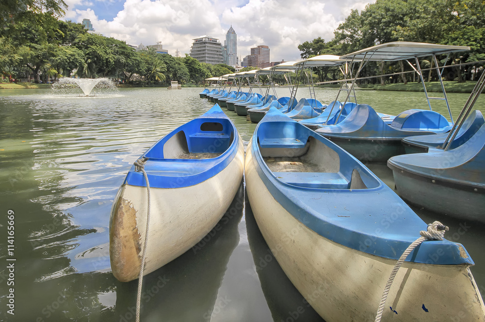 BANGKOK, THAILAND - SEPTEMBER 11: Canoe boats for rent at Lumphini Park located under Ratchadamri Road, near Silom MRT Station and  Saladaeng BTS station in BANGKOK THAILAND on SEPTEMBER 11, 2012