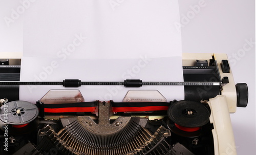 typewriter with paper sheet. Space for your text, close up