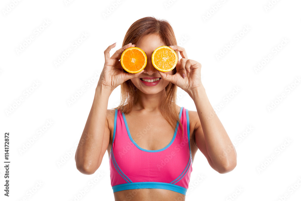 Beautiful Asian healthy girl with orange fruit over her eyes Beautiful Asian healthy girl with orange fruit over her eyes