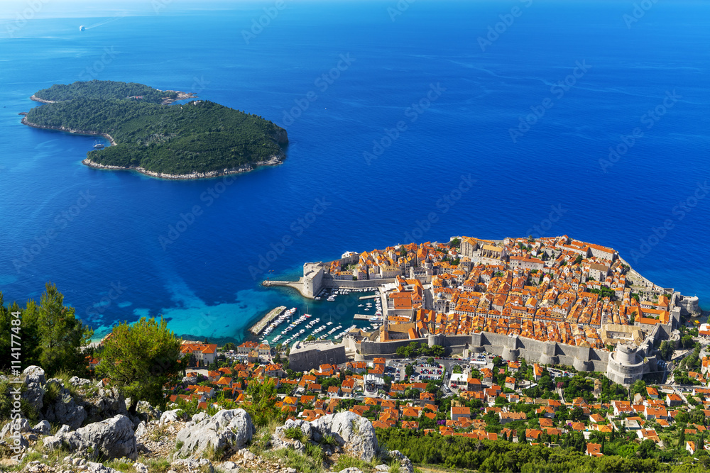 Fototapeta premium Croatia. South Dalmatia. Aerial view of Dubrovnik, medieval walled city (it is on UNESCO World Heritage List since 1979) and Lokrum Island (nature reserve)