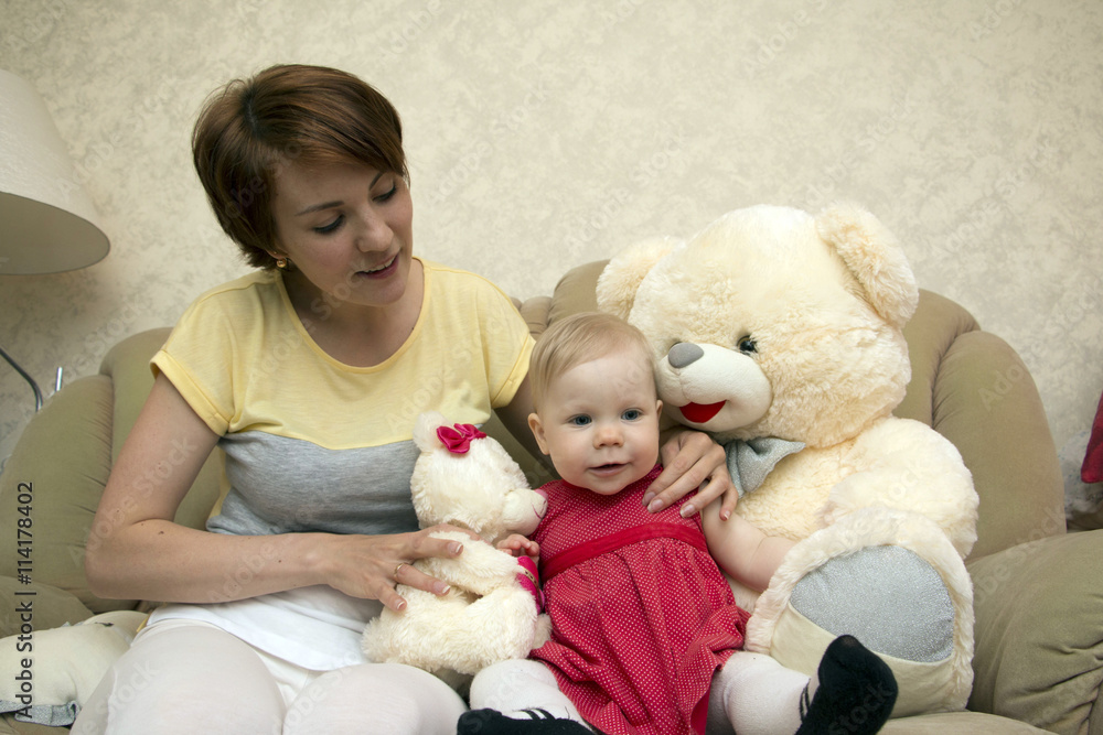 Small cute baby and mom in the room Small cute baby and mom in the room