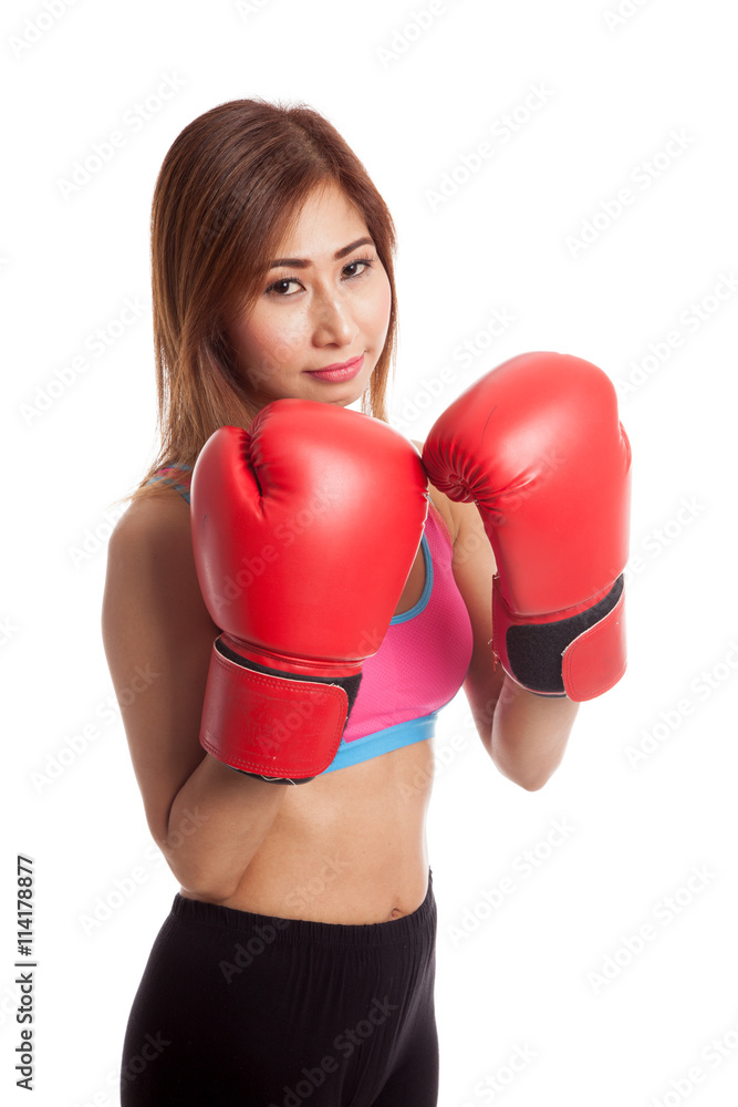 Beautiful healthy Asian girl with red boxing glove Beautiful healthy Asian girl with red boxing glove