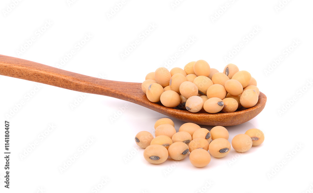 soy beans in wooden spoon on white background soy beans in wooden spoon on white background