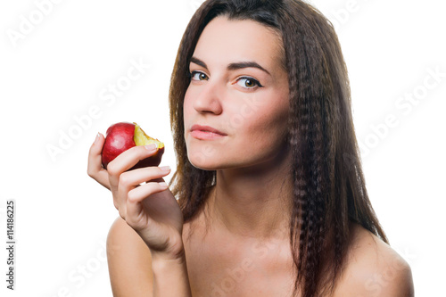 the woman eats an apple