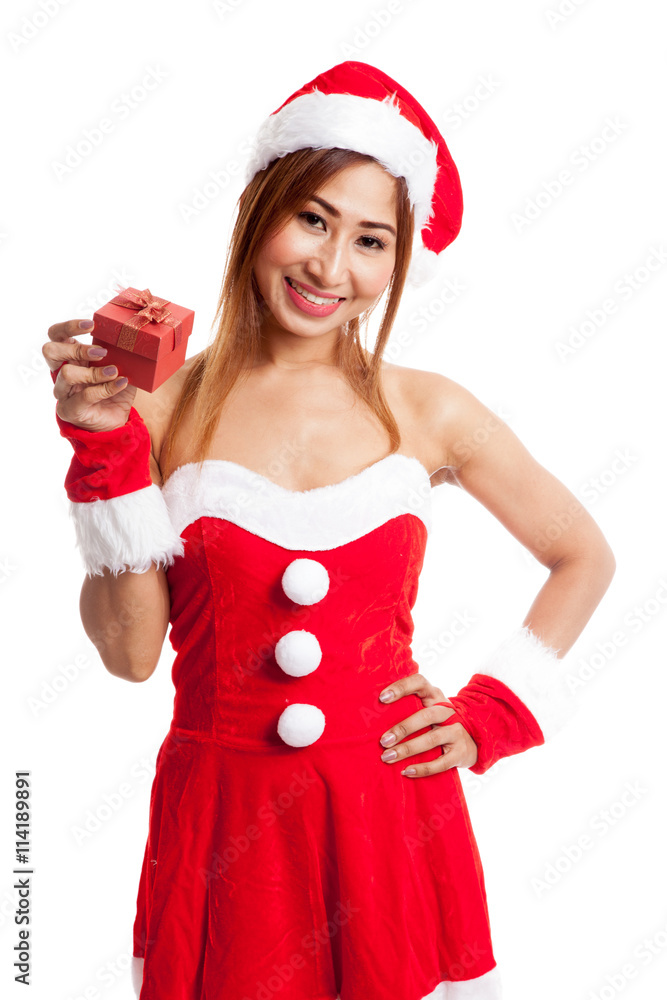 Asian Christmas girl with Santa Claus clothes and red gift box Asian Christmas girl with Santa Claus clothes and red gift box