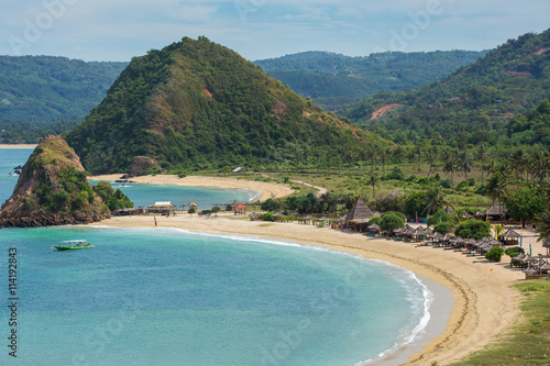 Tropical resort on Kuta sand beach, Lombok, Indonesia photo