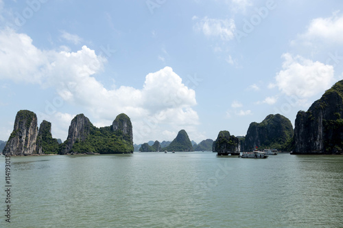 Sea landscape with tourist boat in Halong Bay Vietnam photo
