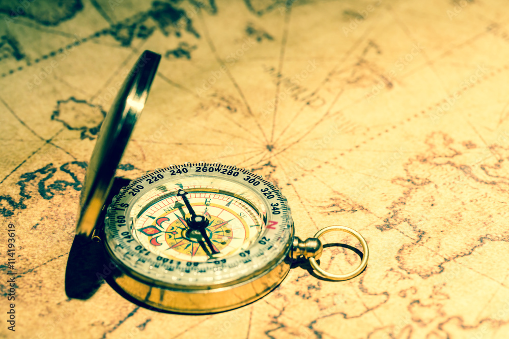 Compass and vintage map