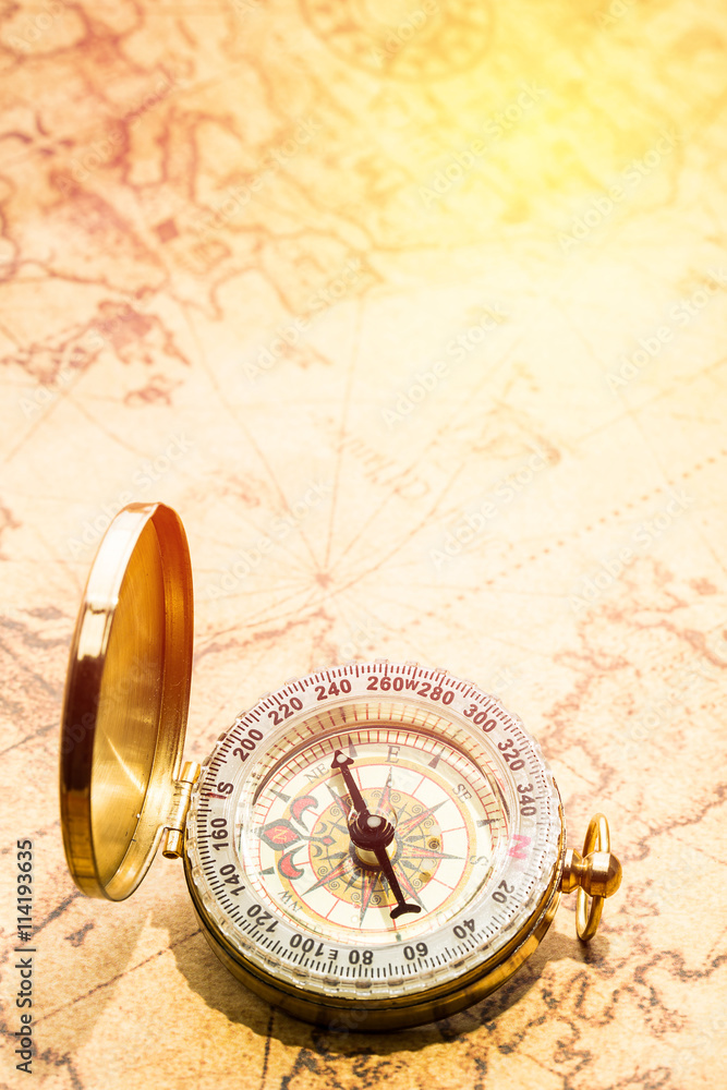 Compass and vintage map