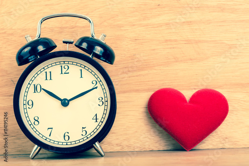 Valentine day. Alarm clock and love heart