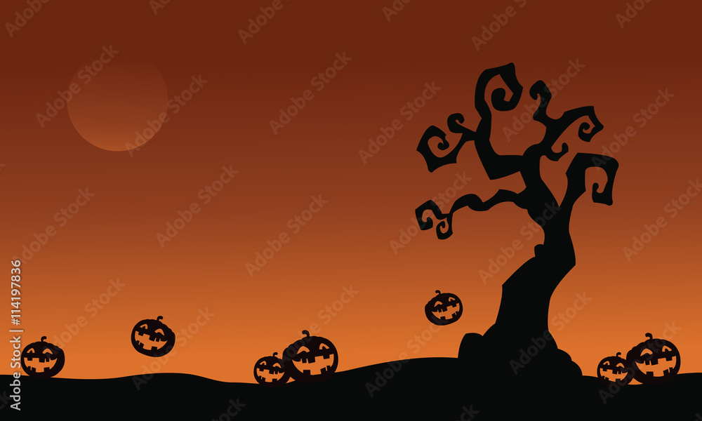 Halloween pumpkins and dry tree
