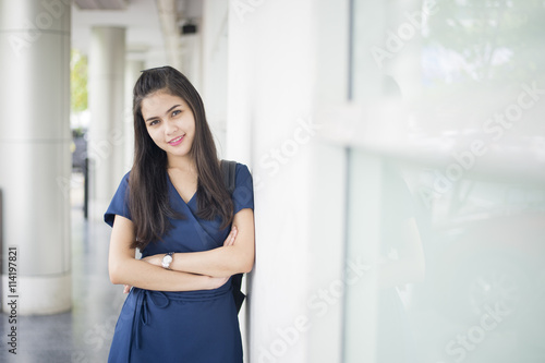 A portrait of an Asian university student on campus Free Download A portrait of an Asian university student on campus - GFXLoad